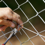 Chain Link Fence Repair: A Guide to Costs, DIY Fixes & Professional Solutions